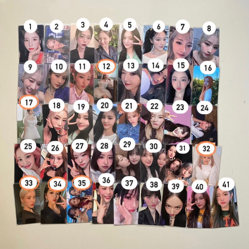 various photocards pc loona heejin hyunjin haseul yeojin vivi kimlip jinsoul choerry yves chuu gowon