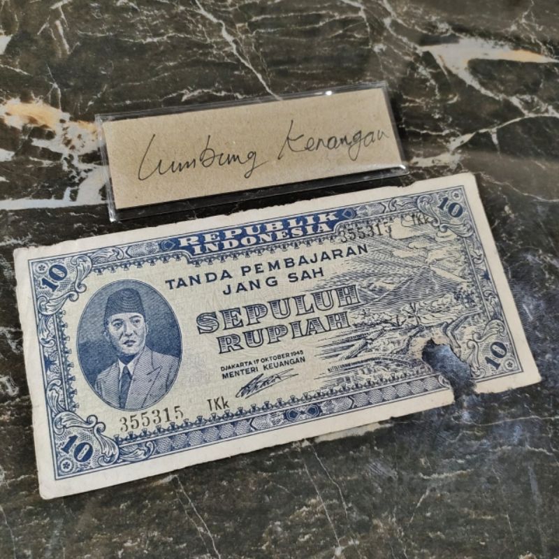 

Noser 355315 TKk sukarno 10 rupiah 1945