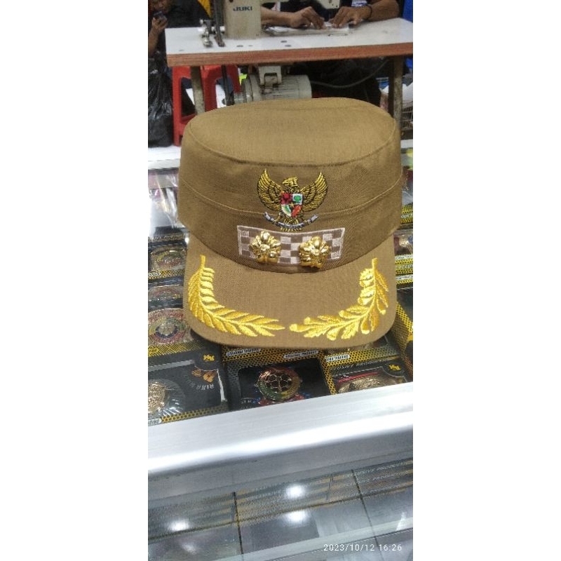 topi komando lurah camat