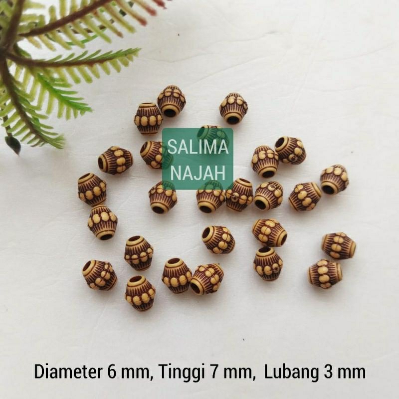 Manik Tabung etnik oval 7 mm. mote plastik corak kerang kayu aksesoris murah