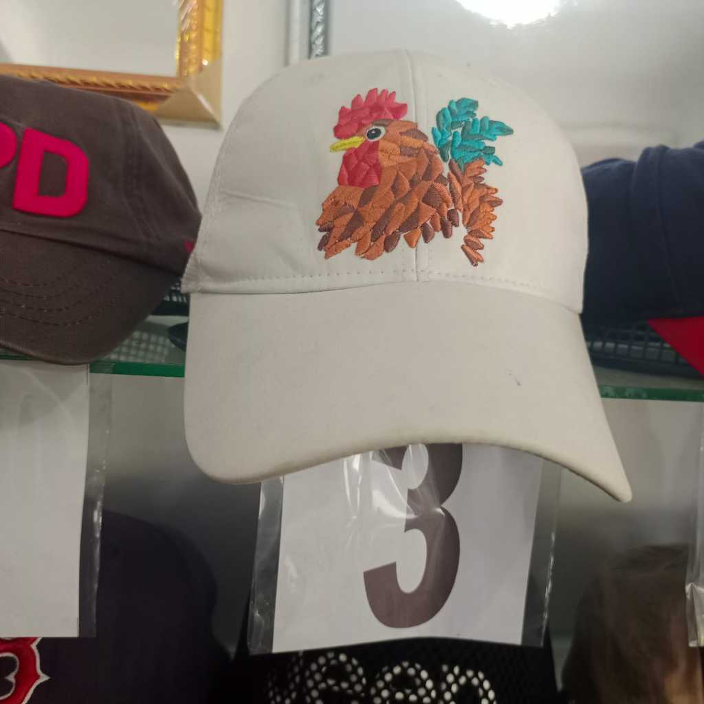 topi ala goorin bros ayam putih
