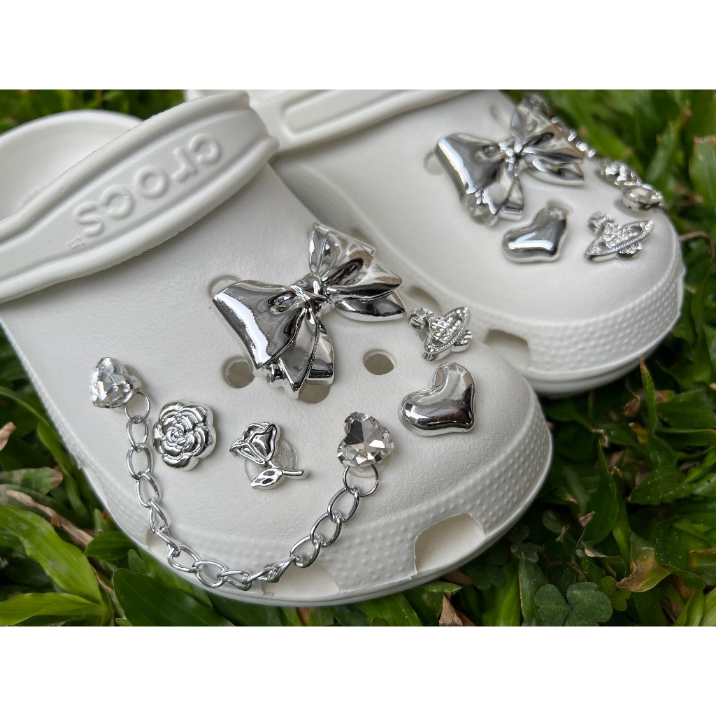 Orchid Store - Aksesoris Jibbitz 3D 1 pcs Hiasan Sandal Crocs bentuk Pita Silver Random | Jibbitz Mu