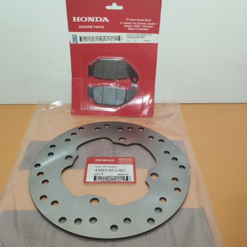 Piringan cakram + kampas rem motor Honda mega pro new