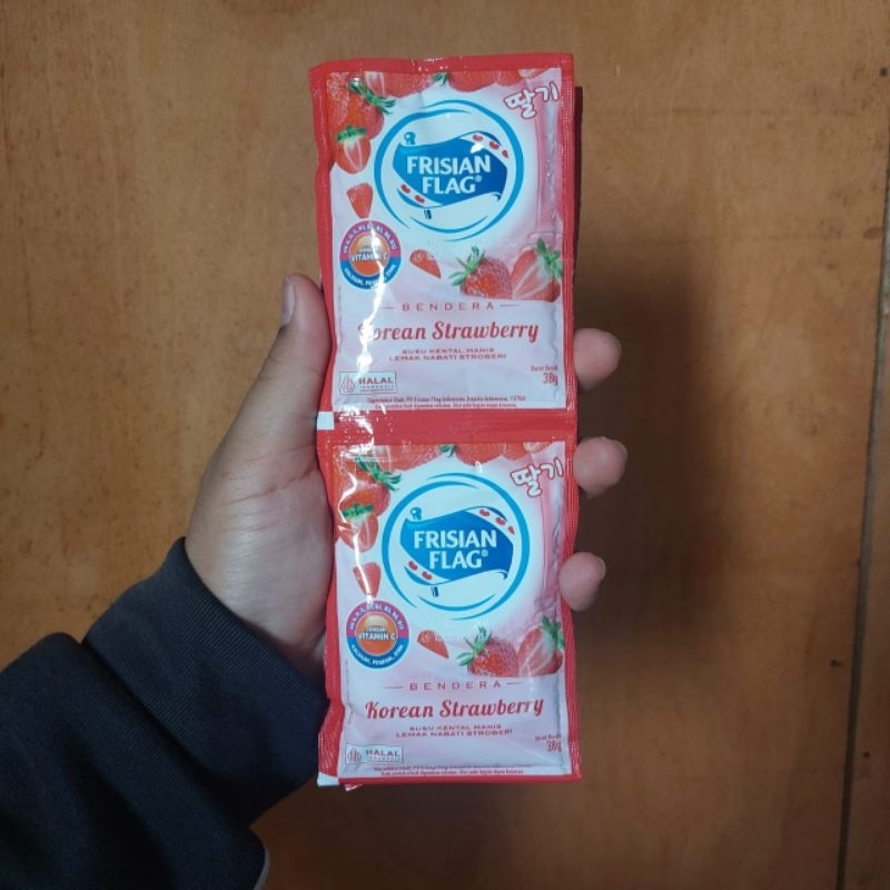 

frisian flag susu kental manis rasa stobery 1 pack isi 6 pcs