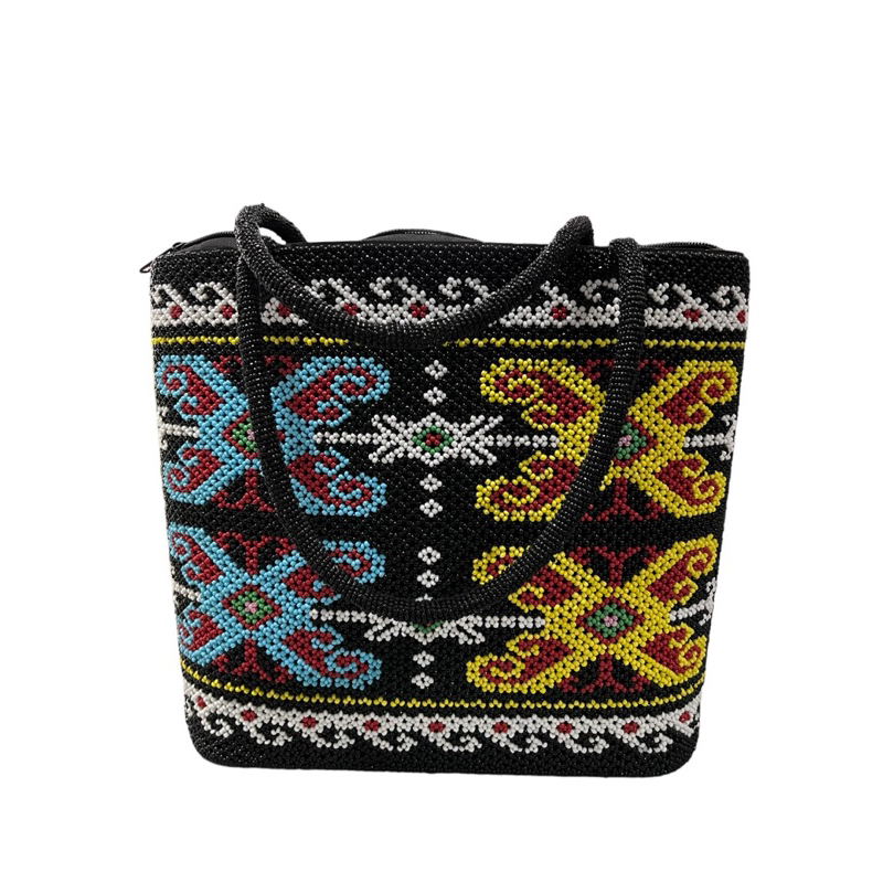 Tas wanita etnik motif dayak manik