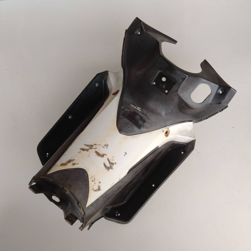 LEGSHIELD KONTAK SUPRA X 125 FI ORIGINAL COPOTAN LEKSIL TENGAH SUPRA X125 FI ORIGINAL