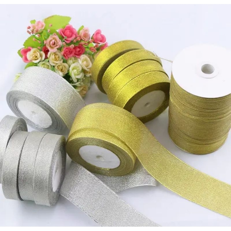 

Pita Glitter 4 cm Per Roll 25 Yard / Pita Glitter 4 cm Gold dan Silver Per Roll 25 Yard Murah