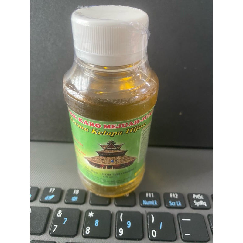 

Minyak Karo Aroma Kelapa Hijau