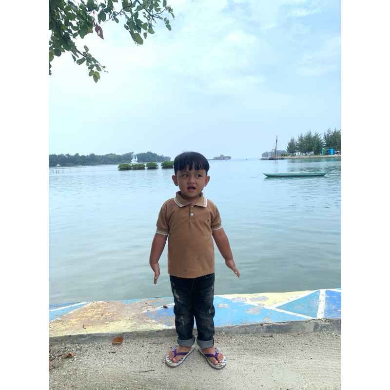 kaos polo anak cream