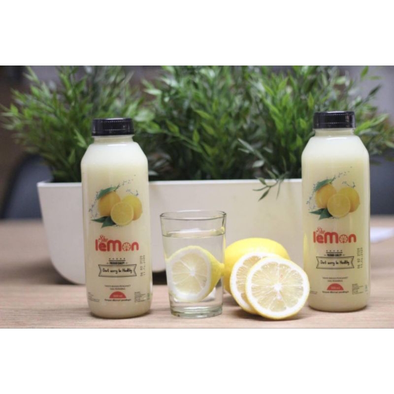 

she lemon minum pure lemon 250 ml kuning