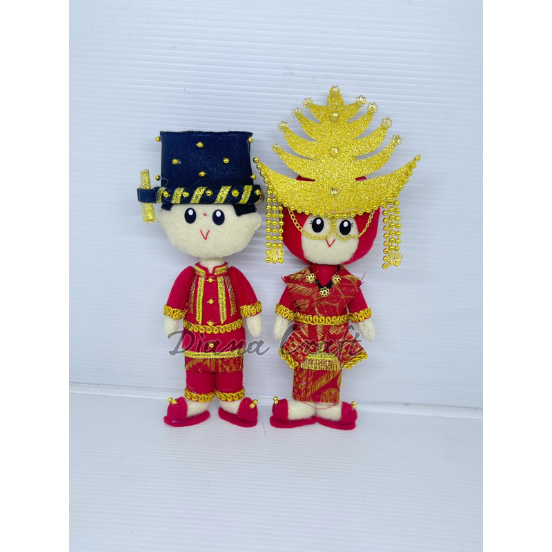 Boneka pengantin adat mandailing