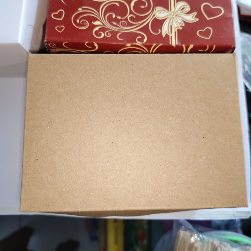 

Dos kue, R3 coklat polos isi 50 lembar