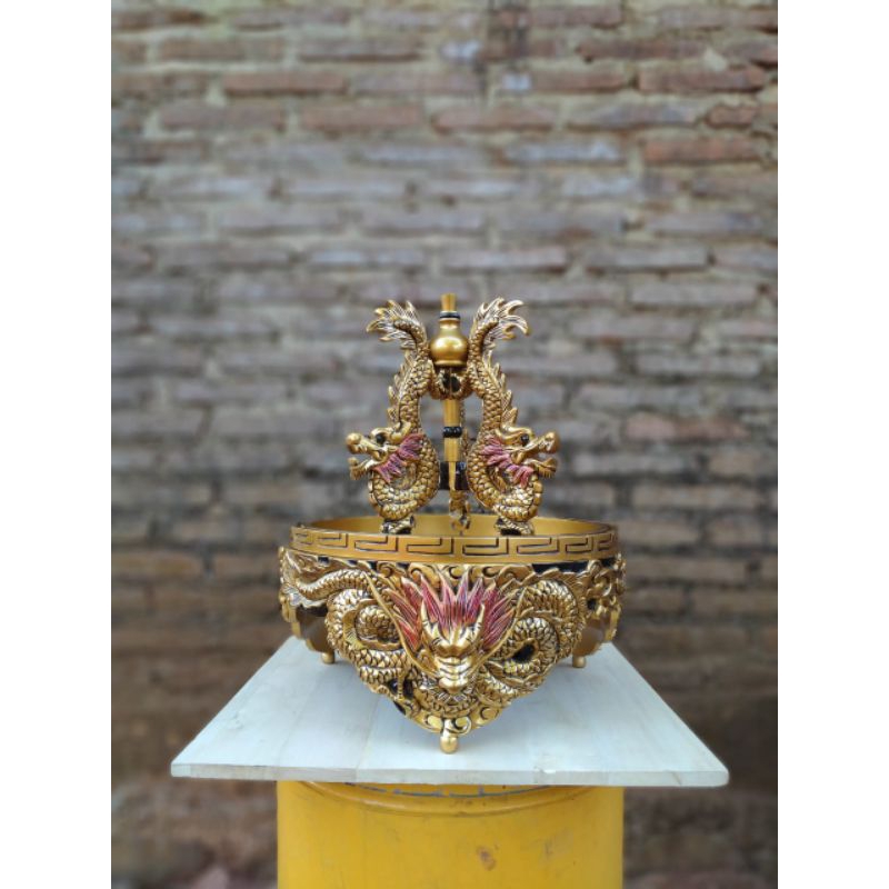 Tebok pleci helopet ukir motif naga pion cakram