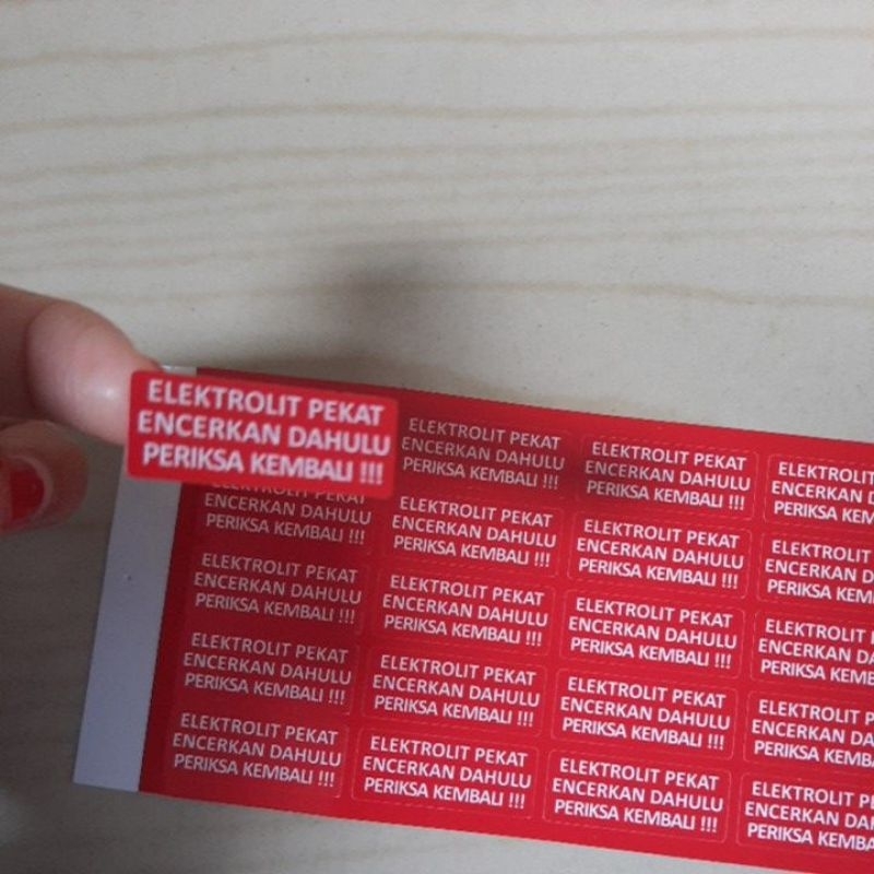 stiker label elektrolit pekat merah