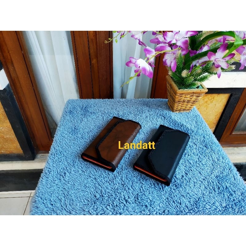Dompet Taji Lurus
