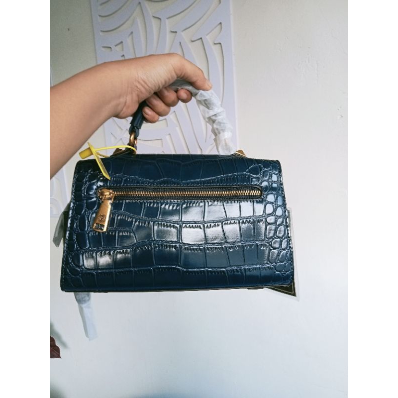 tas import speedy croco purade