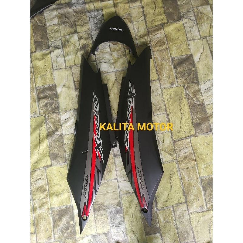 Cover body supra 125 fi body samping belakang