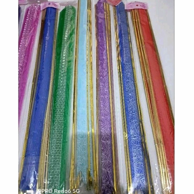 

1pak isi 10pcs pita serut/pita kado tarik motif 3x45cm
