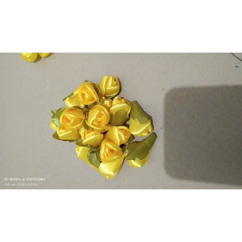 

aplikasi bunga pita(mawar kuncup)