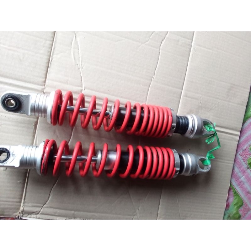 shock belakang variasi Yamaha motor RX king original copotan