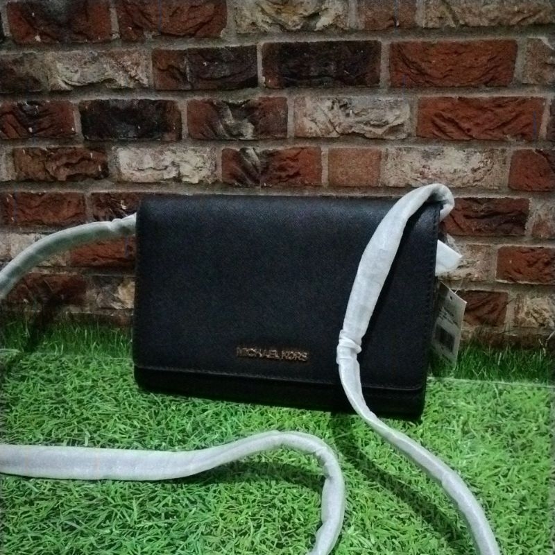 tas crossbody clutch jet set item MK original