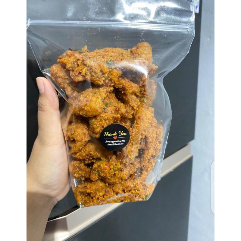 

Keripik Kulit Ayam Pedas Daun jeruk 250gram