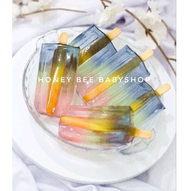 

RAINBOW JELLY STICK MINIM 15 PCS agar agar pelangi rasa buah anggur strawberry melon jeruk warna warni manis segar dessert makanan camilan cemilan snack anak puding pudding stik jeli