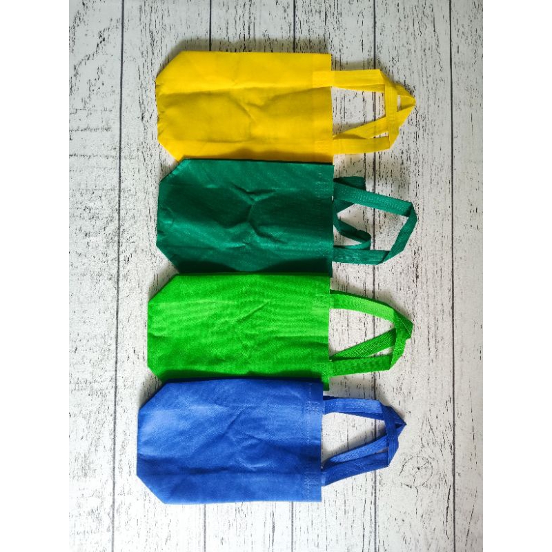 

Tas spunbond handle uk 20×25×6/tas kain kantong tali polos (isi 20pcs)