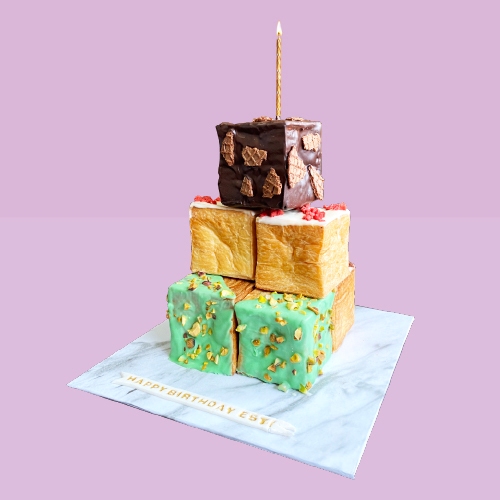 

Croissant Cubes Birthday Cake by Cupcakes Company