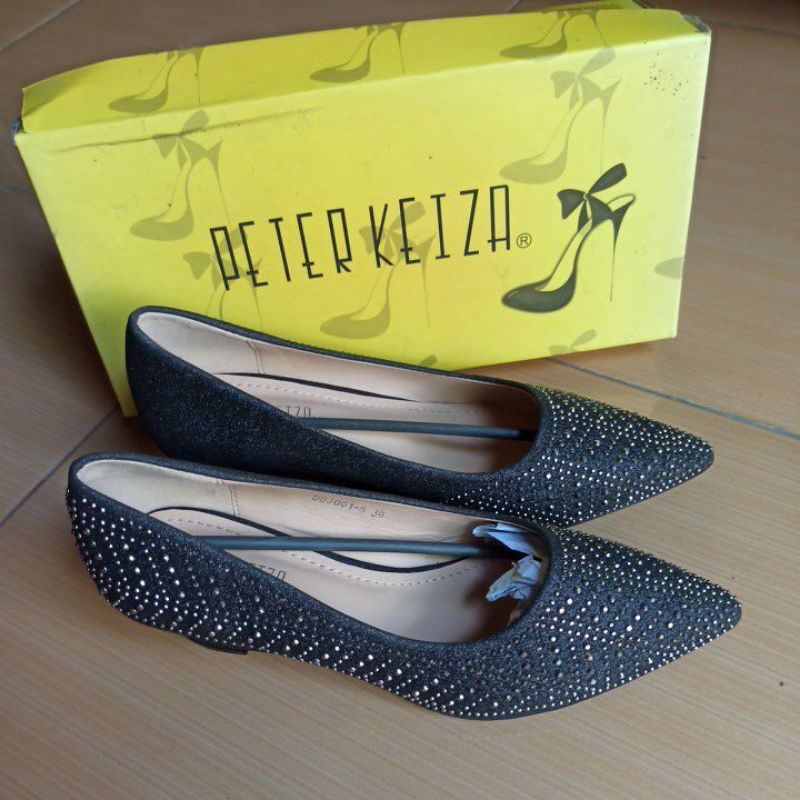 Sepatu Peter Kezia
