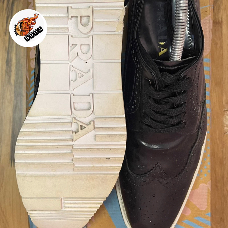 prada wingtip brogue size 42
