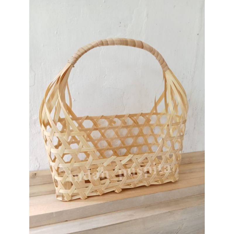

tas souvenir pendek bagian depan 26x10x13cm