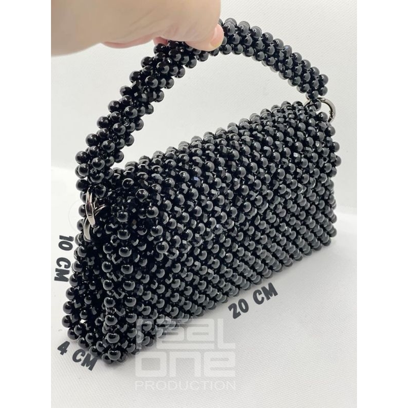 Tas manik mutiara sintetis