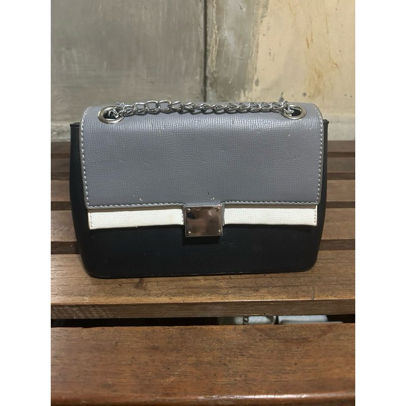 tas selempang lorica