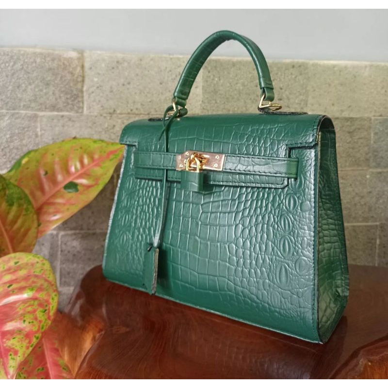 TAS KULIT SAPI EMBOS