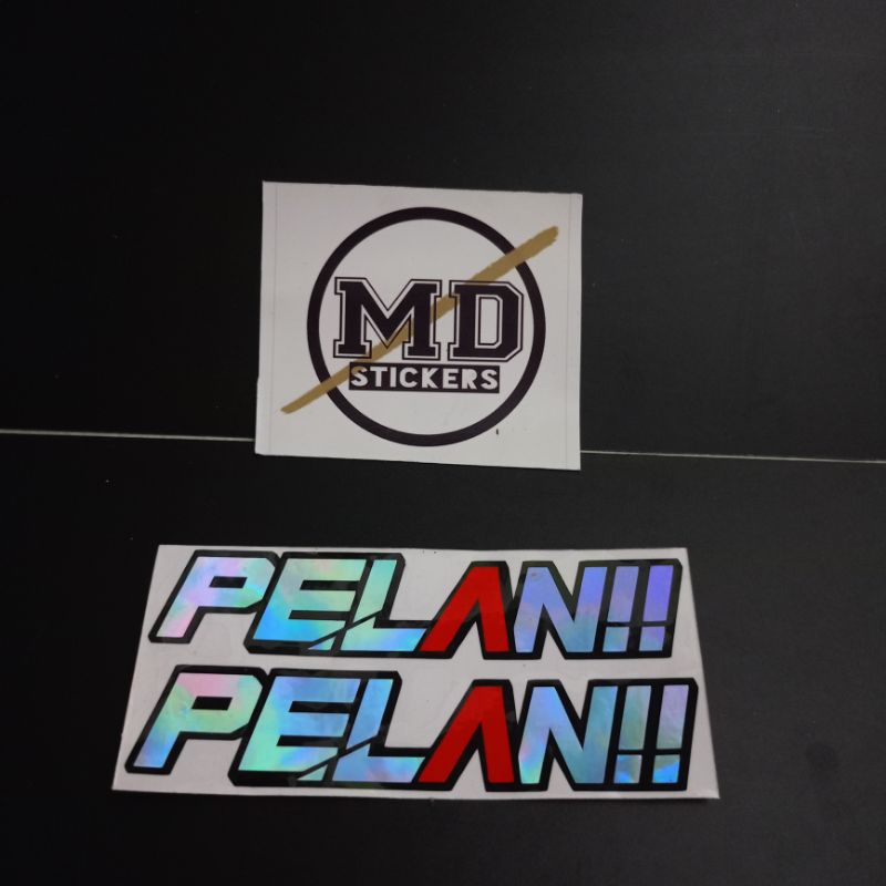 Stiker motor pelan pelan