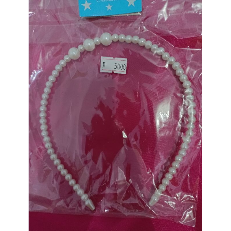 Bando mutiara putih