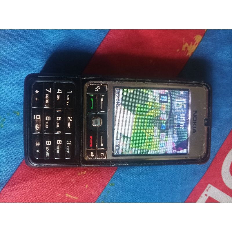 Hp jadul Nokia tipe 3250 bahan