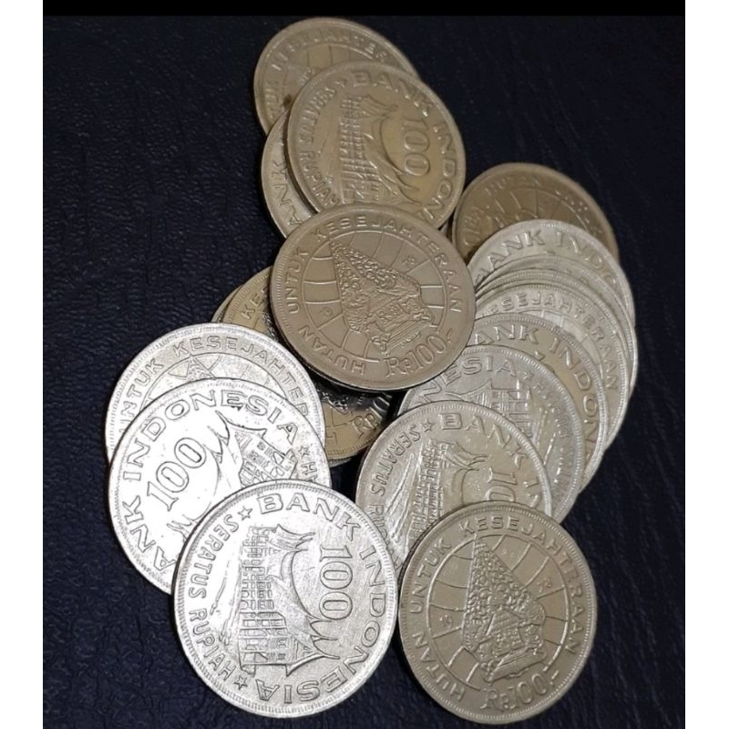 uang koin 100 rupiah tipis wayang