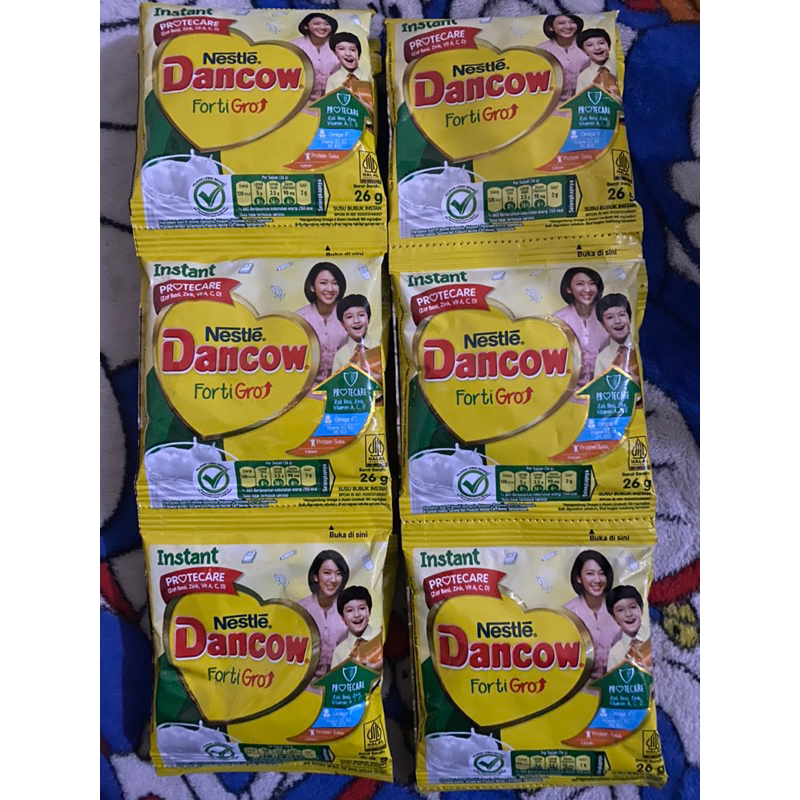 

Susu Dancow Instant putih Sachet renceng (isi 10 sachet X 27g)