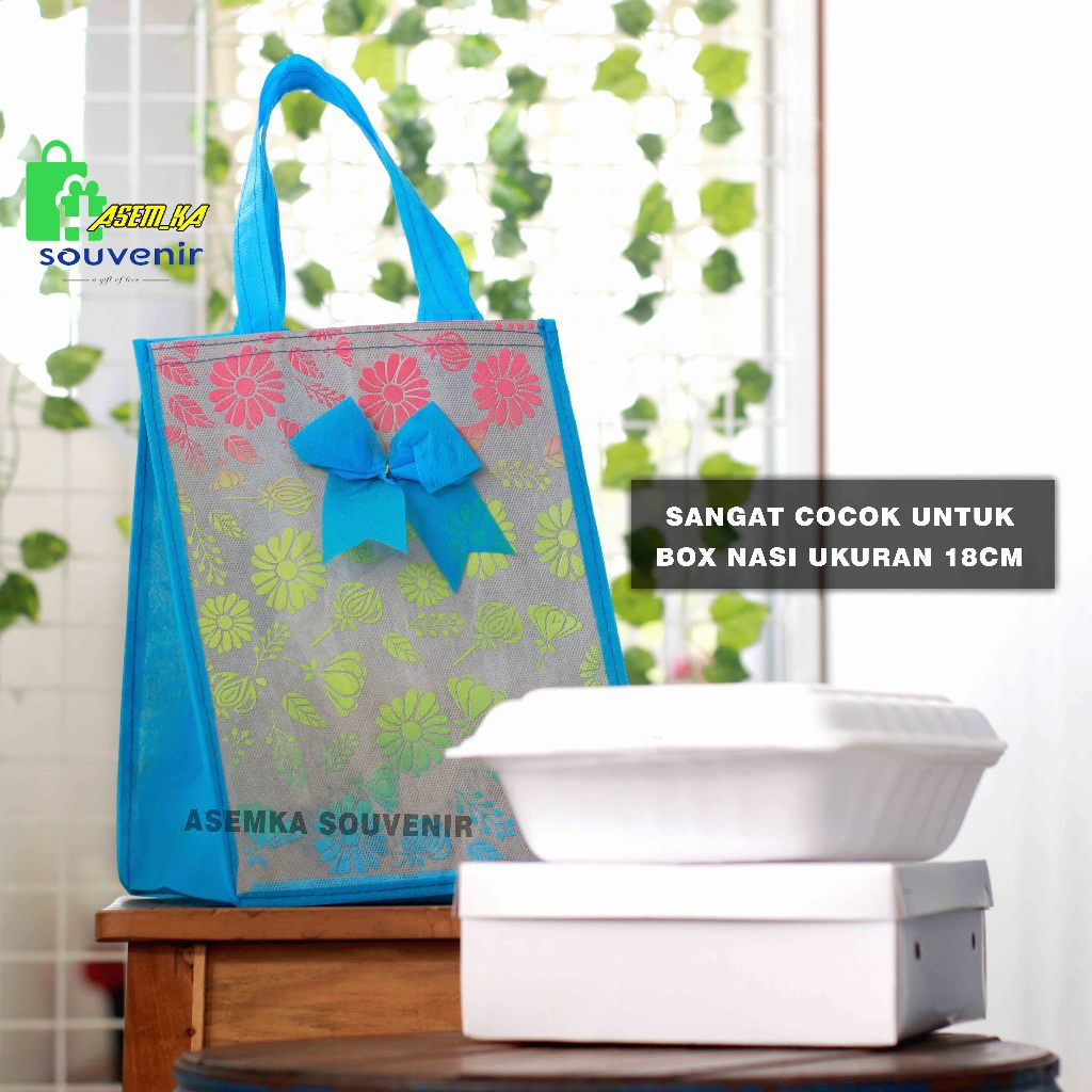 

Tas Hajatan Motif Abu Variasi Pita Untuk Box Nasi 18 Cm Isi 12 Pcs