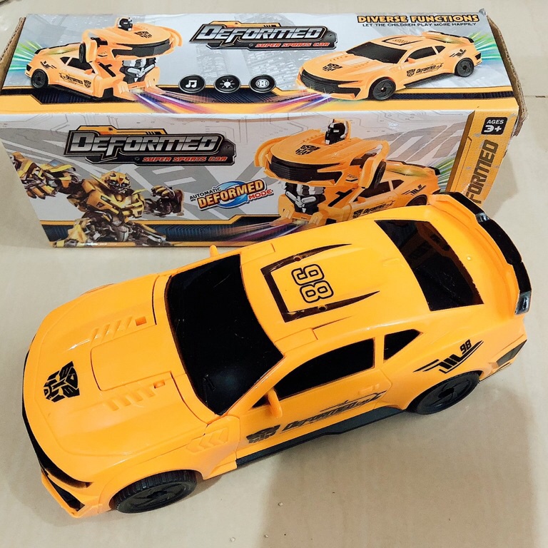 LANGSUNG ATC Mainan Mobil jadi Robot Suara dan Lampu 3D