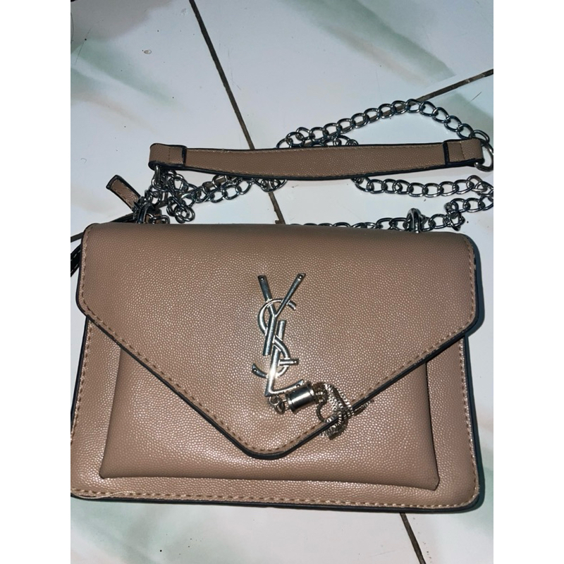 tas ysl