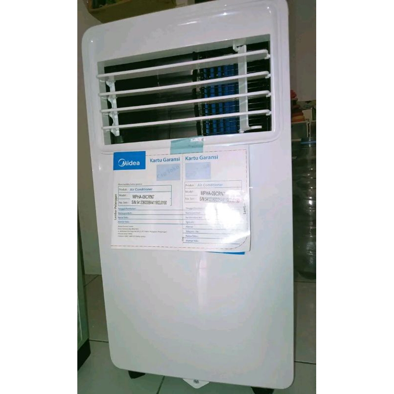 AC PORTABLE MIDEA ½ PK