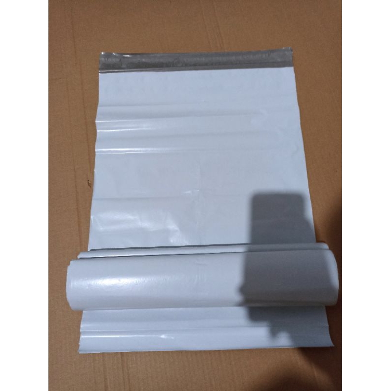 

plastik packing polymailer ekonomis LDPE putih 30x40 isi +-100 Harga super ekonomis/murah