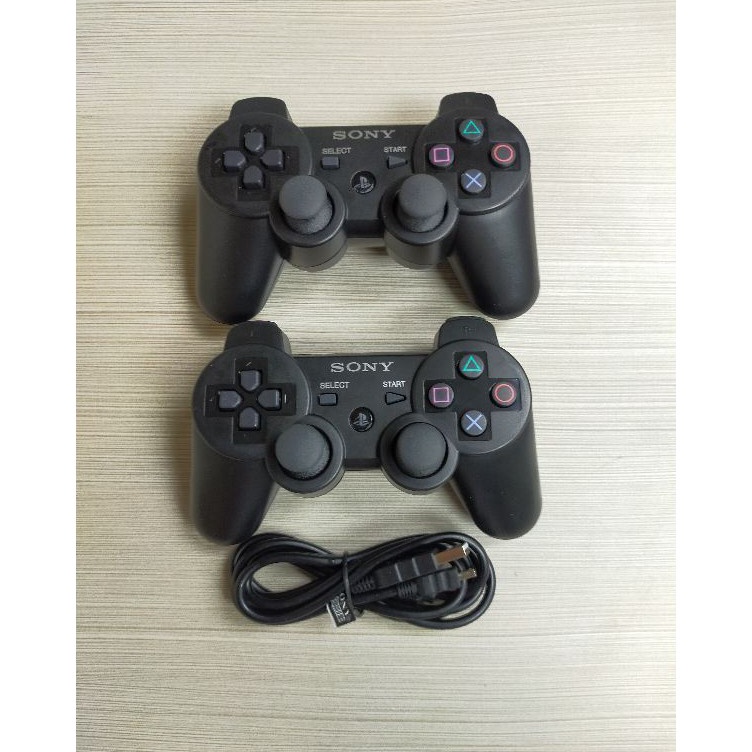 KODE M77F PAKET 2 PCS STIK PS3 WIRELESS ORI PABRIK HITAM  1 PCS KABEL USB CHARGER STIK PS3