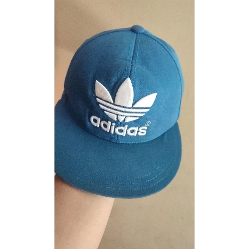 topi Adidas warna biru  ukuran XL (60cm)