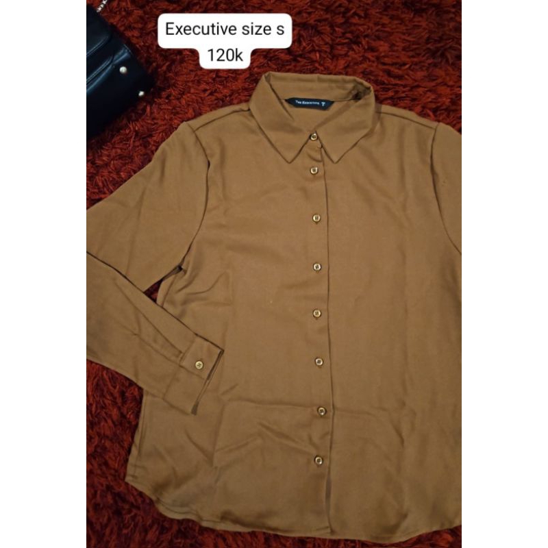 brand uniqlo dan executive