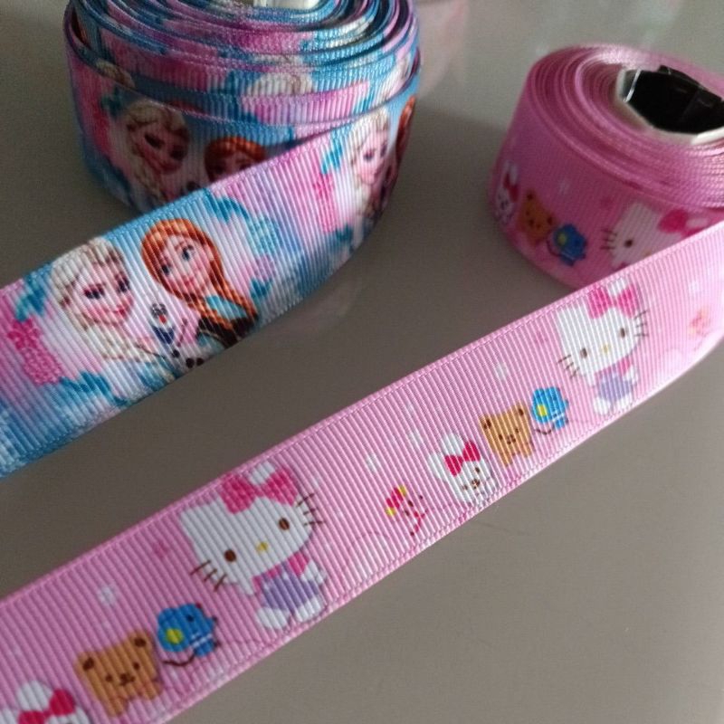 

Pita motif frozen /pita motif hello kitty meteran 2.2cm 0.8inci