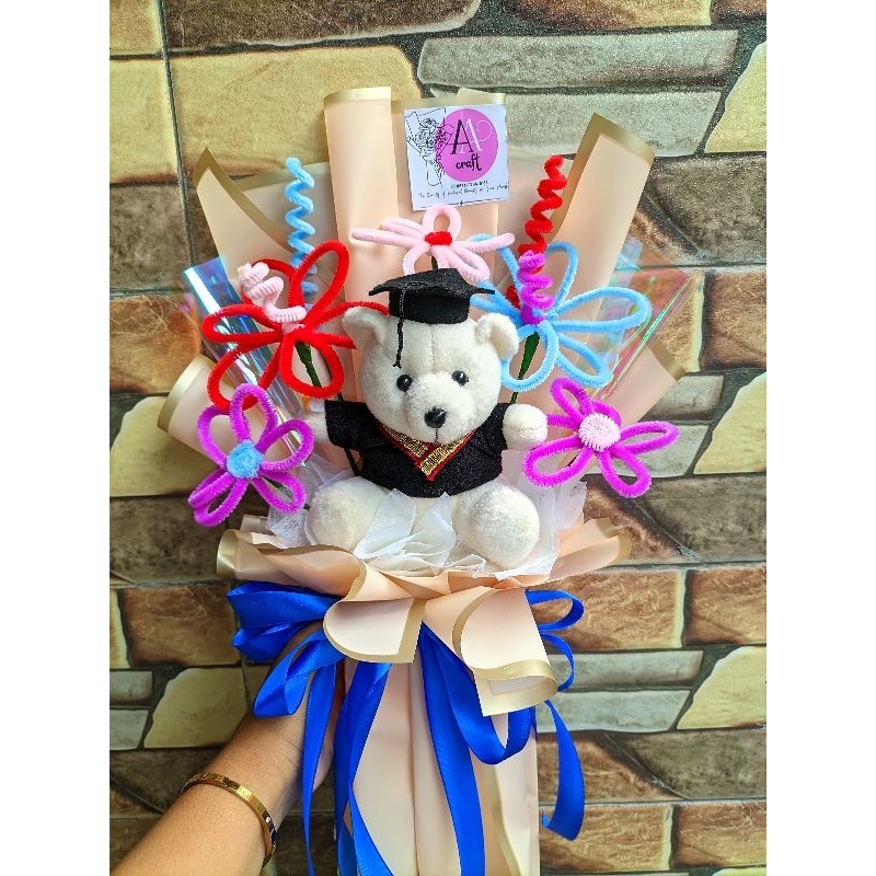 

buket boneka dan bunga kawat bulu cantik elegan untuk hadiah wisuda ulang tahundll